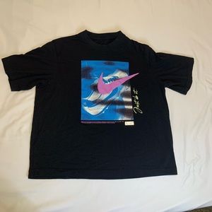 Small Nike tee with Nike Cortez graphic and printed back patches